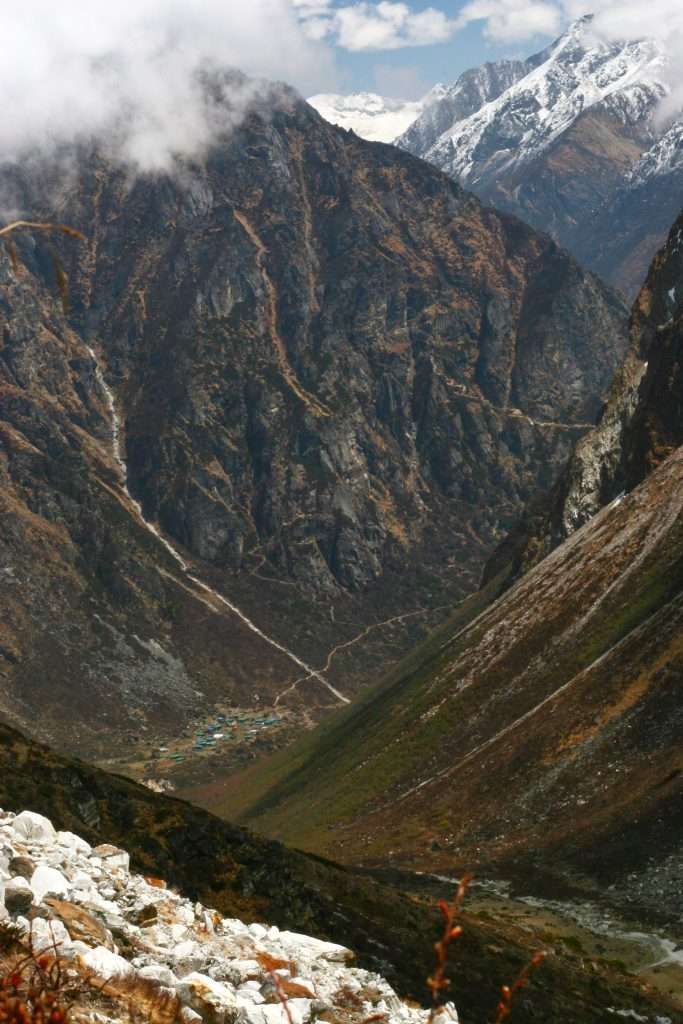 Lapchi village and LApchi Snow Mountain from the route to Manjushiri Lake, Lapchi Kang, Nepal